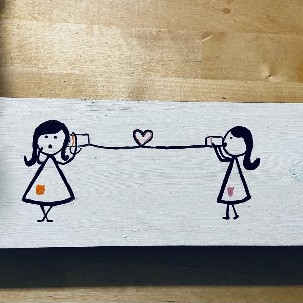 Hand painted wooden sign